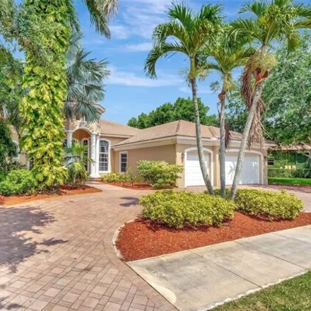 Rent this 6 bed house on 3219 West Stonebrook Circle in Davie, FL 33330