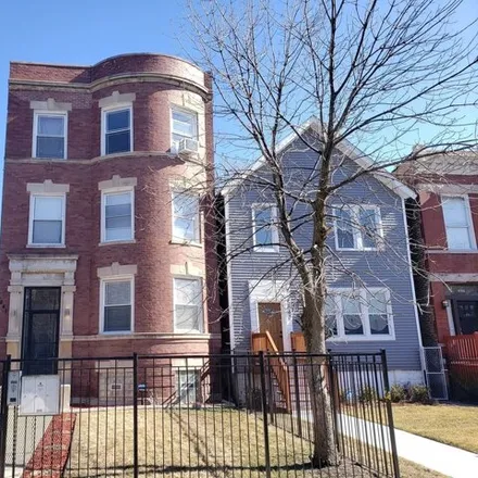 Rent this 4 bed condo on 5841 South Indiana Avenue in Chicago, IL 60621