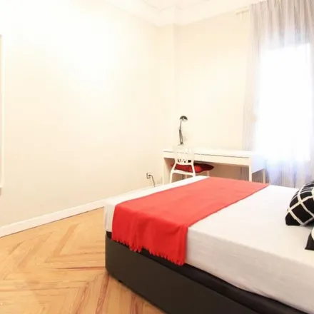 Rent this 13 bed apartment on Calle de Francisco de Rojas in 1, 28010 Madrid