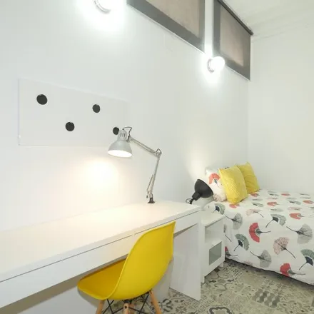 Rent this 11 bed room on Carrer Gran de Gràcia in 12, 08001 Barcelona