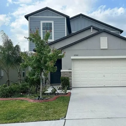 Rent this 5 bed house on Storybook Cabin Way in Pasco County, FL 34637
