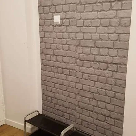 Rent this 12 bed apartment on Marshal Street 58 in 00-545 Warsaw, Poland
