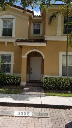Rent this 3 bed townhouse on 3055 SW 129th Way