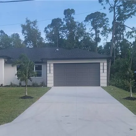 Buy this 4 bed house on 8311 North Cypress Drive in San Carlos Park, FL 33967