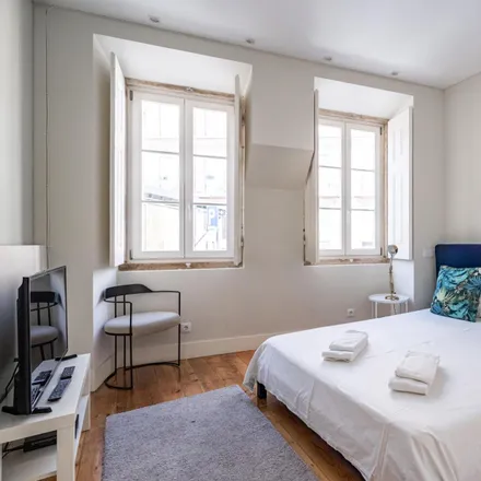 Rent this 3 bed apartment on Roman Theatre Museum in Rua de São Mamede 3A, 1100-059 Lisbon