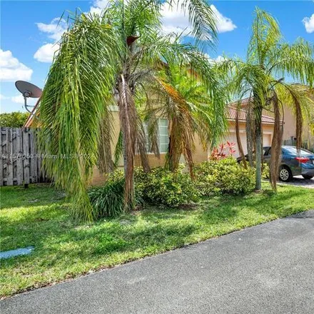 Rent this 3 bed house on 12046 SW 133 Ave