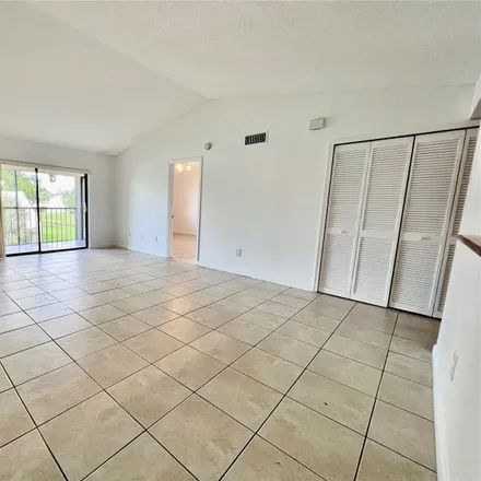 Rent this 2 bed condo on Southwest 57th Avenue in Palm Beach County, FL 33073