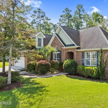 Buy this 4 bed house on 4899 Wyndcrest Loop in Shallotte, NC 28470