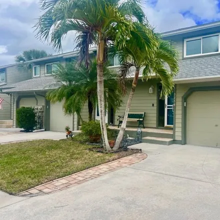 Buy this 2 bed house on 3252 Northeast Holly Creek Drive in Jensen Beach, FL 34957