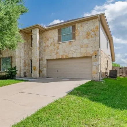 Rent this 4 bed house on 4004 Rocky Shore Ln in Pflugerville, Texas