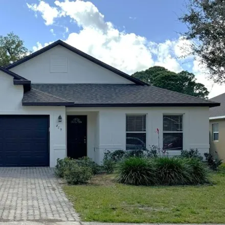 Rent this 4 bed house on 423 Alison Street in Titusville, FL 32780