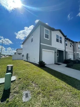 Rent this 3 bed townhouse on 632 Madison Dr in Davenport, Florida