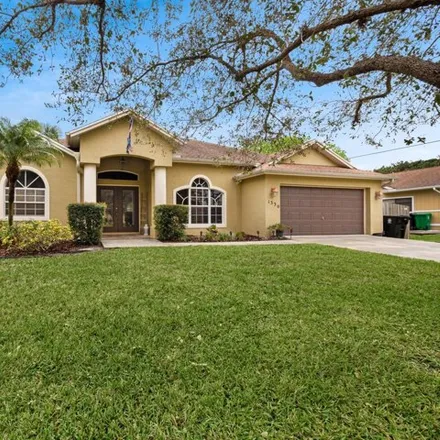 Buy this 3 bed house on 1344 Southwest Century Avenue in Port Saint Lucie, FL 34953