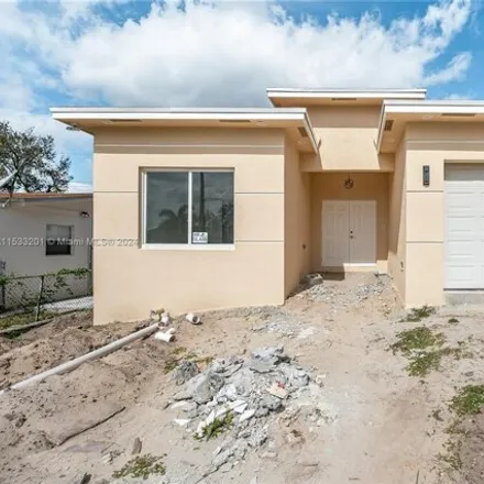 Buy this 3 bed house on 2101 Northwest 9th Court in Fort Lauderdale, FL 33311