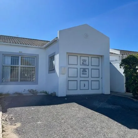 Rent this 2 bed townhouse on Oakburn Place in Milnerton, Parow