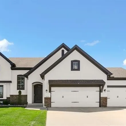 Buy this 4 bed house on 599 Lasley Branch Court in Raymore, MO 64083