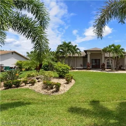 Rent this 4 bed house on 3425 SE 4th Ave in Cape Coral, Florida