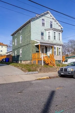 Buy this 7 bed townhouse on 88 Howe Street in Globe Village, Fall River