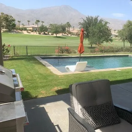 Rent this 3 bed house on 81225 Red Rock Road in La Quinta, CA 92253