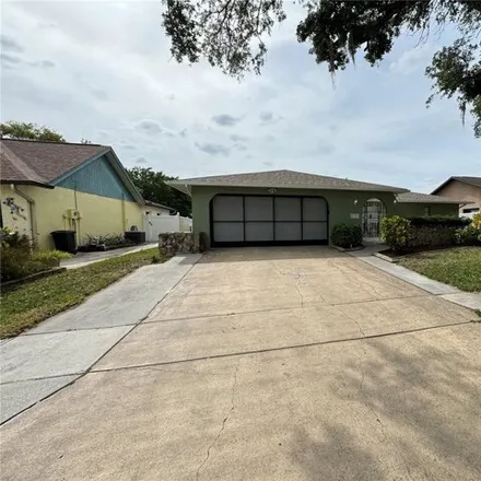 Rent this 2 bed house on 8727 Aruba Lane in Jasmine Estates, FL 34668