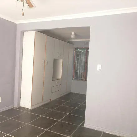 Rent this 4 bed townhouse on 5th Avenue in Grassy Park, Western Cape