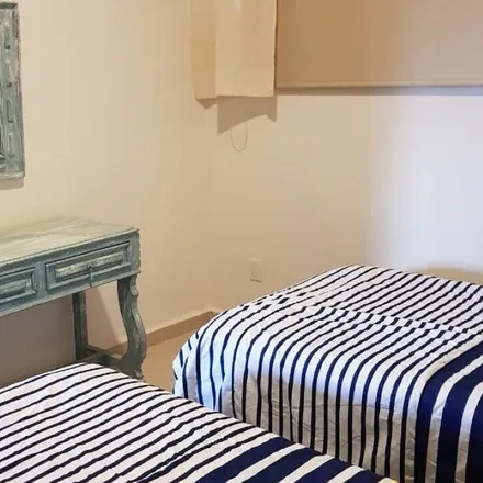 Rent this 3 bed apartment on Toks Playa del Carmen in Chemuyil 52 Mza 1Lt.1 Local A-10, Nueva Creación