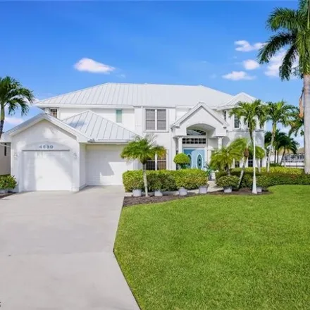 Buy this 4 bed house on 4634 Southeast 20th Avenue in Cape Coral, FL 33904