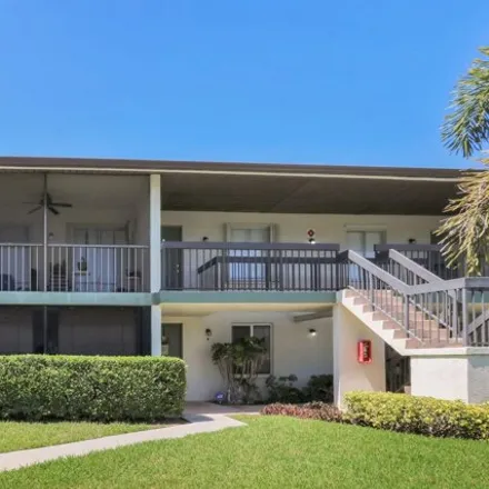 Rent this 2 bed condo on 6285 Chasewood Dr Apt E in Jupiter, Florida