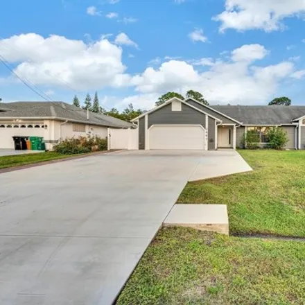 Buy this 4 bed house on 2842 Southeast Peru Street in Port Saint Lucie, FL 34984