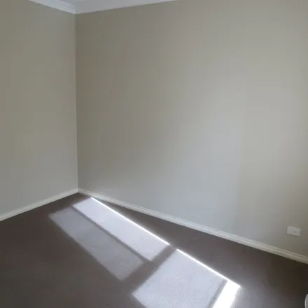 Rent this 3 bed townhouse on Parkland Grove in Kingsbury VIC 3083, Australia
