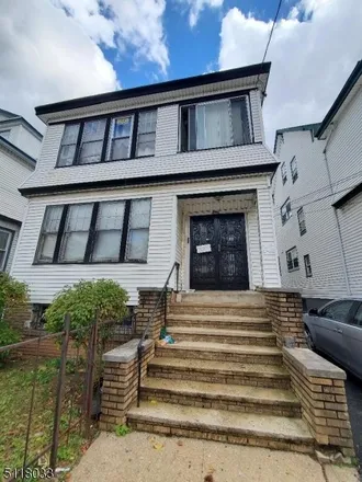Buy this 7 bed townhouse on 24 Stockman Place in Irvington, NJ 07111