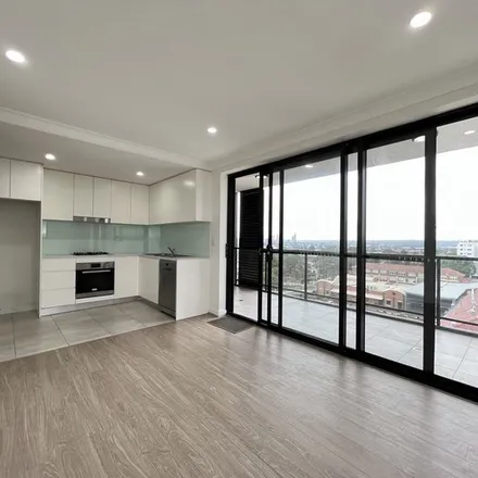 Rent this 1 bed apartment on Trinity Catholic College in 13 Park Road, Auburn NSW 2144