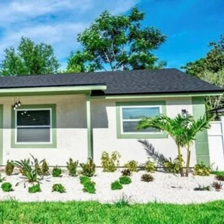 Buy this 3 bed house on 1435 Burning Tree Road in Tarpon Springs, FL 34689
