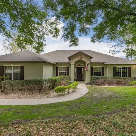 Buy this 4 bed house on 15643 Paddock Drive in Lake County, FL 34756