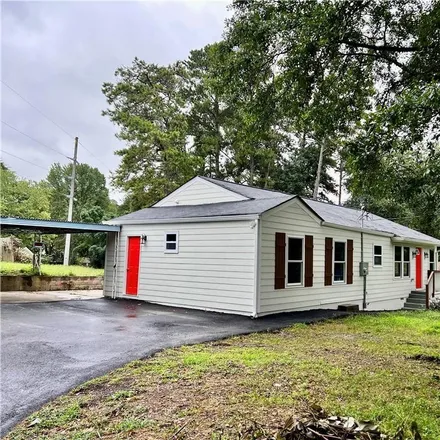 Buy this 4 bed house on 332 Cranfill Road Southeast in Fair Oaks, Cobb County