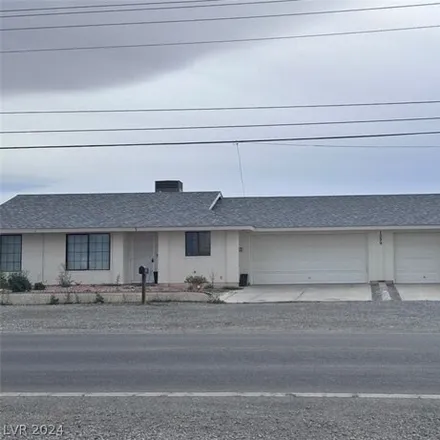 Rent this 2 bed house on 1317 East Calvada Boulevard in Pahrump, NV 89048