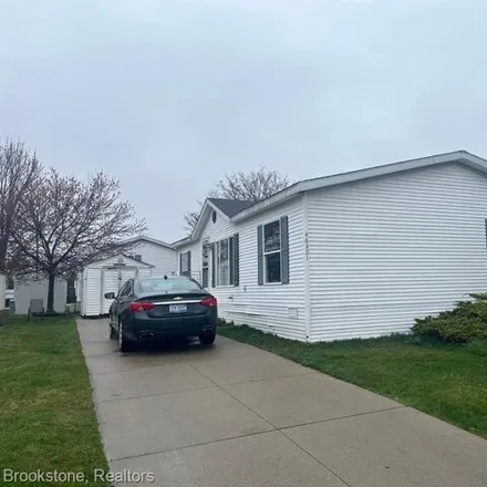 Buy this 3 bed condo on Abbey Drive in Macomb Township, MI 48044