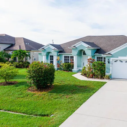 Buy this 3 bed house on 5832 Dooley Circle in Port Saint Lucie, FL 34986