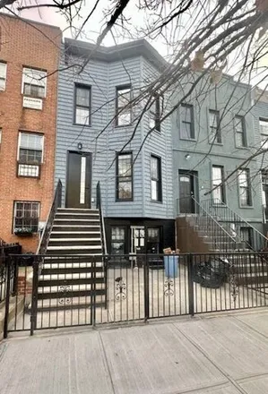 Buy this 5 bed house on 2046 Pacific Street in New York, NY 11233
