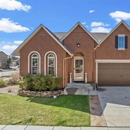Buy this 5 bed house on Wolf Center Drive in Colorado Springs, CO 80924