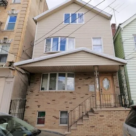 Buy this 4 bed house on 119 Warwick Street in Newark, NJ 07105