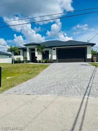 Buy this 4 bed house on 1423 Southwest 21st Avenue in Cape Coral, FL 33991