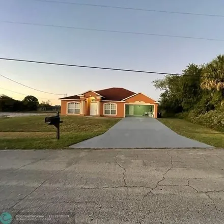 Buy this 3 bed house on 121 Southeast Whitmore Drive in Port Saint Lucie, FL 34984