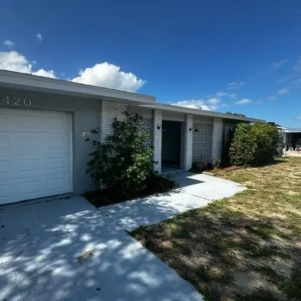 Rent this 3 bed house on 1420 Thoreau Street in Titusville, FL 32780