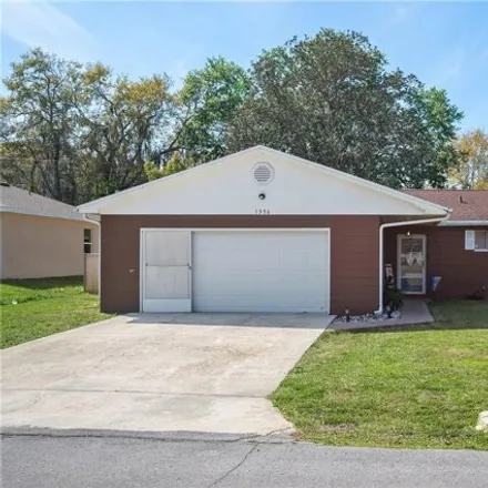 Buy this 3 bed house on 1560 Churchill Court in Combee Settlement, Polk County