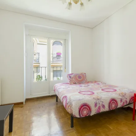 Rent this 6 bed room on Calle de Santa Isabel in 17, 28012 Madrid