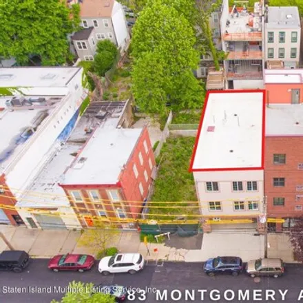 Buy this 8 bed house on 77 Montgomery Avenue in New York, NY 10301