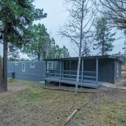 Buy this studio apartment on 199 Broken Bow Road in Lincoln County, NM 88345