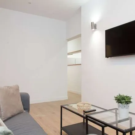 Rent this 12 bed apartment on Madrid in Edificio Princesa, Calle de Santa Cruz de Marcenado