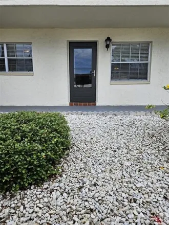 Rent this 2 bed condo on 1380 Doolittle Lane in Palm Harbor, FL 34698